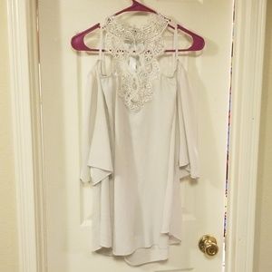 Cold shoulder white crepe blouse with lace neck